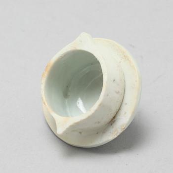 A 20th century porcelain tea pot.