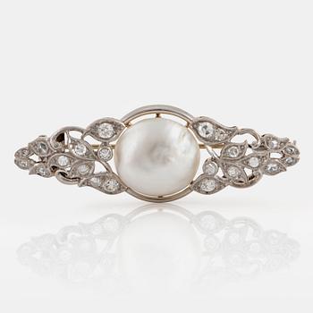 1047. A platinum brooch set with a pearl and old- and rose-cut diamonds.