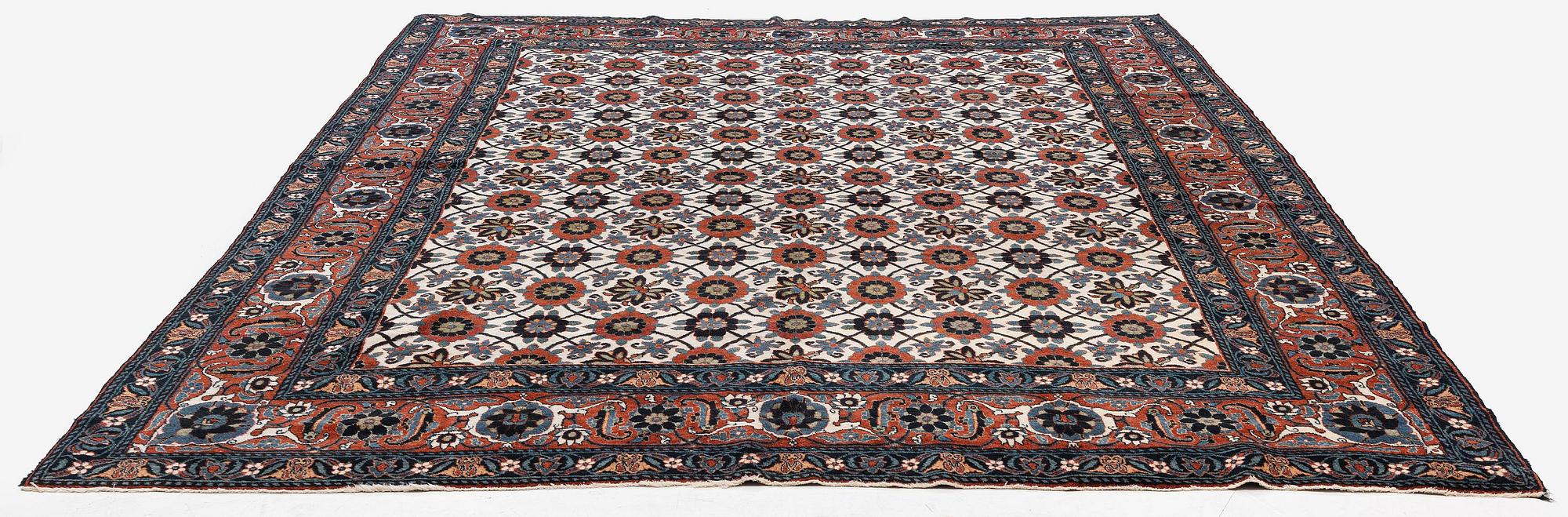 An antique Veramin carpet, West Persia, 380 x 271 cm.