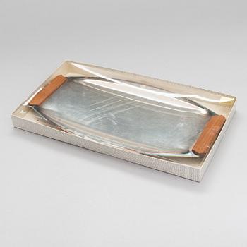 TAPIO WIRKKALA, A 1960s tray in new silver with teak handles, TW 225, marked TW. Hopeakeskus, Finland.