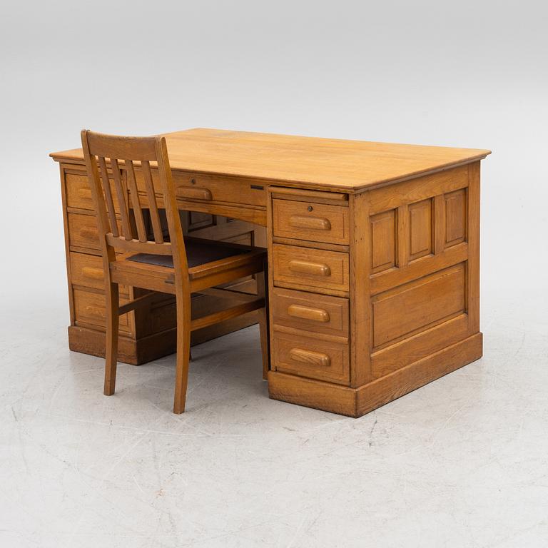 An oak writngdesk with a chair from Åtvidabergs, first part of the 20th century.