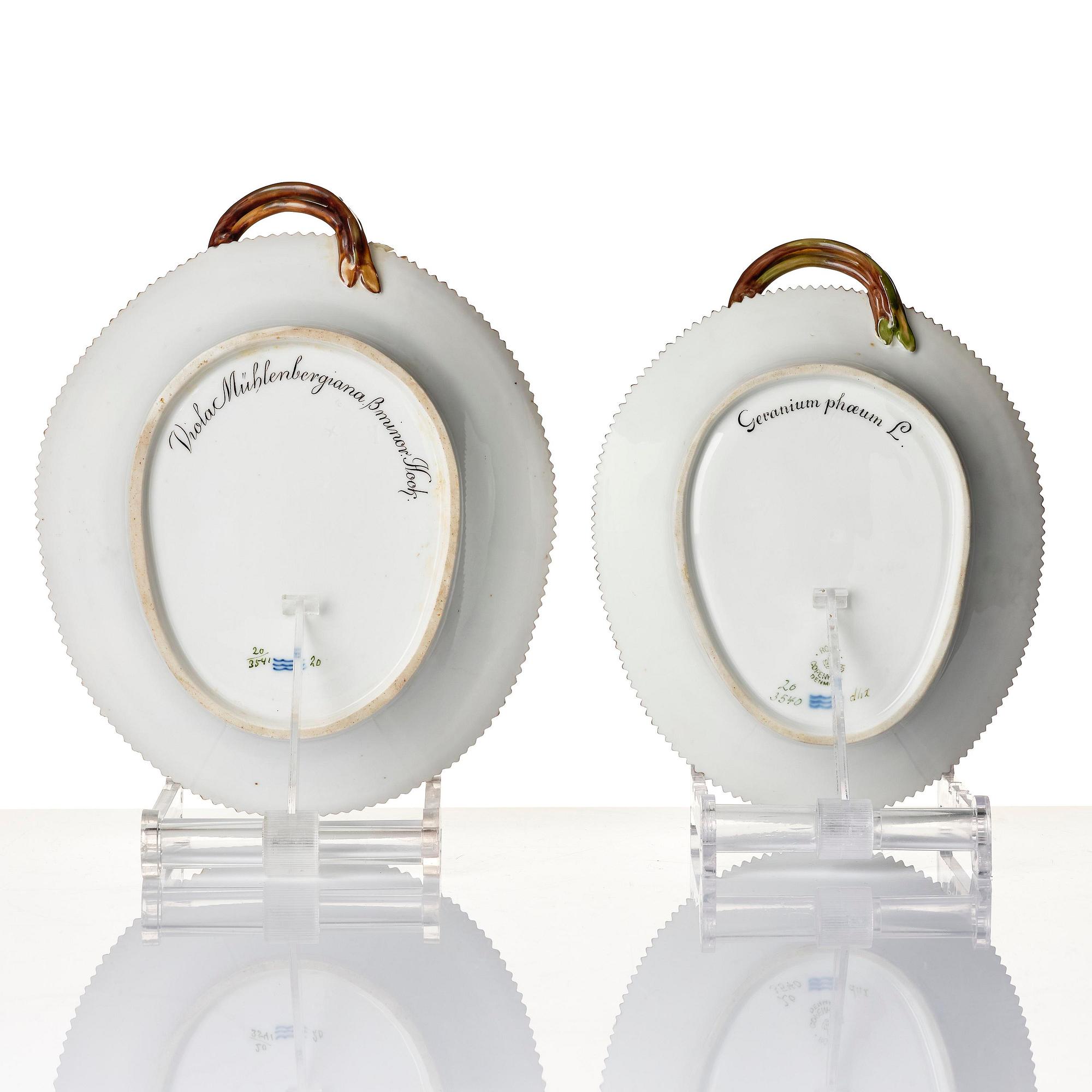 Two Royal Copenhagen 'Flora Danica' leaf shaped dishes, Denmark, 20th century.