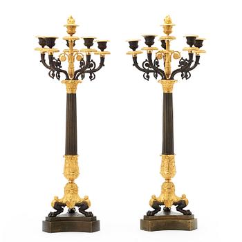 A pair of French Empire 19th century six-light candelabra.