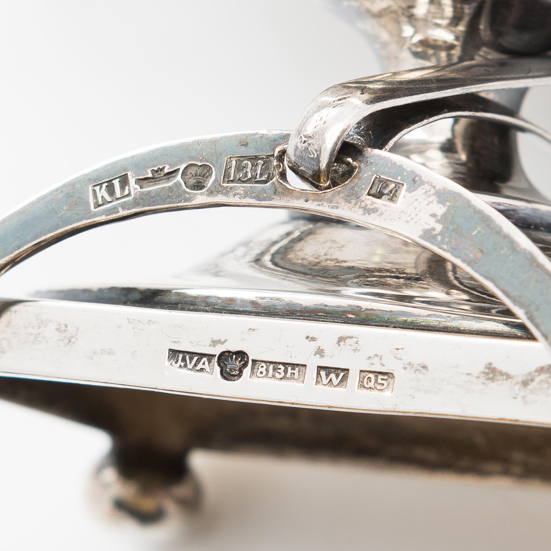 Four Finnish silver tableware objects, maker's marks of Viktor Aarne, O.R. Mellin, and others, 1861-1930.