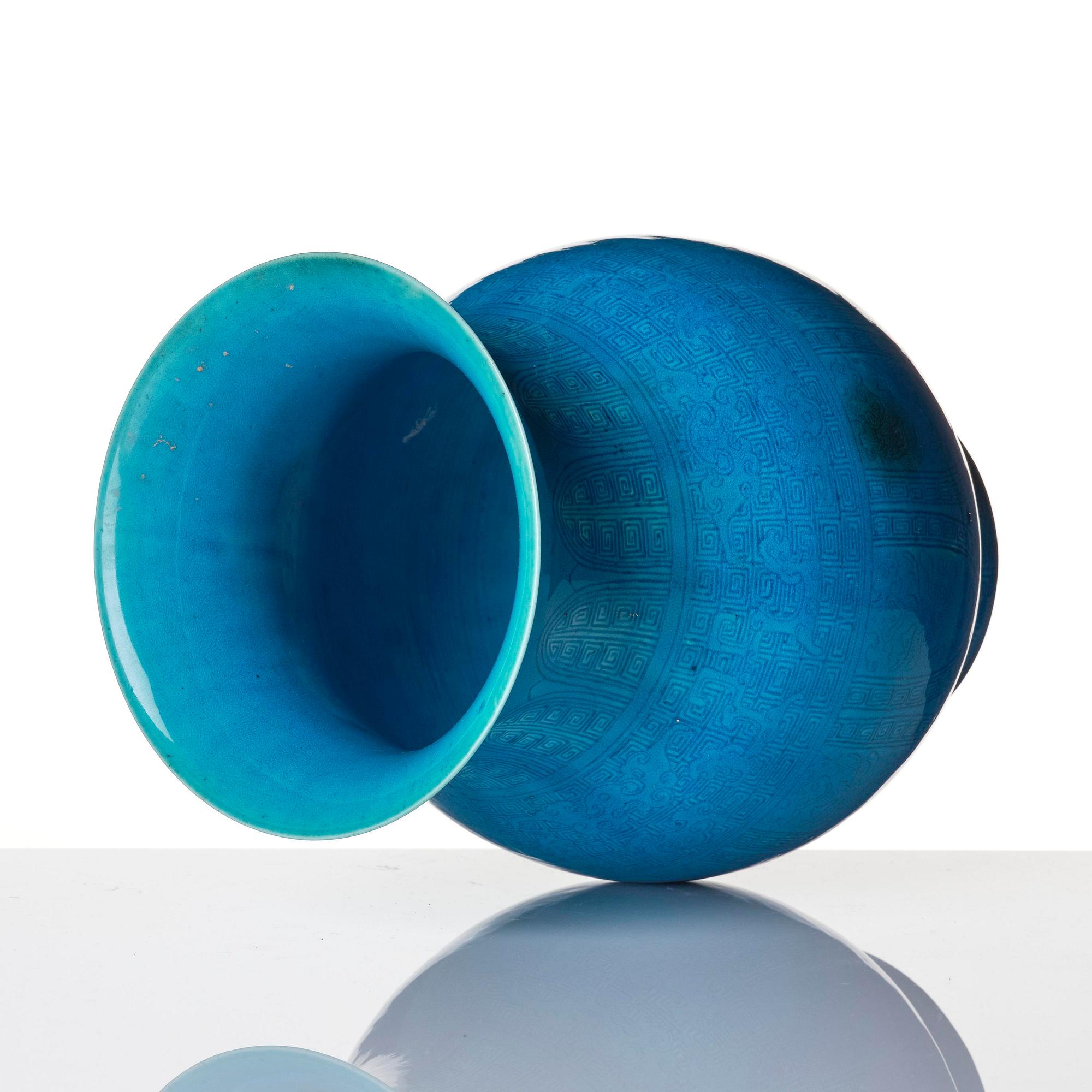 A turquoise glazed vase, zun, Qing dynasty with a Qianlong incised seal mark and of the period.