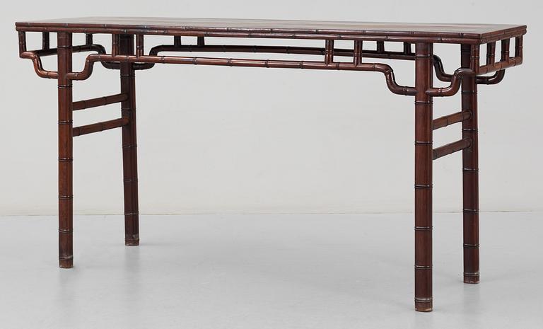 A hardwood free standing table, Qing dynasty.