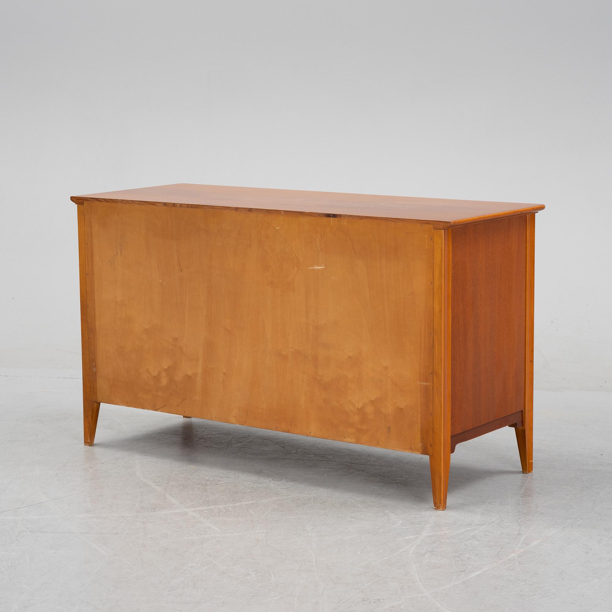 A Swedish Modern mahogany chest of drawers, 1940's/50's.