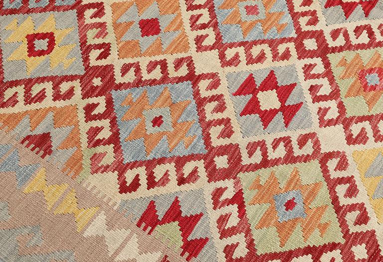 A Kilim rug, approx. 251 x 189 cm.
