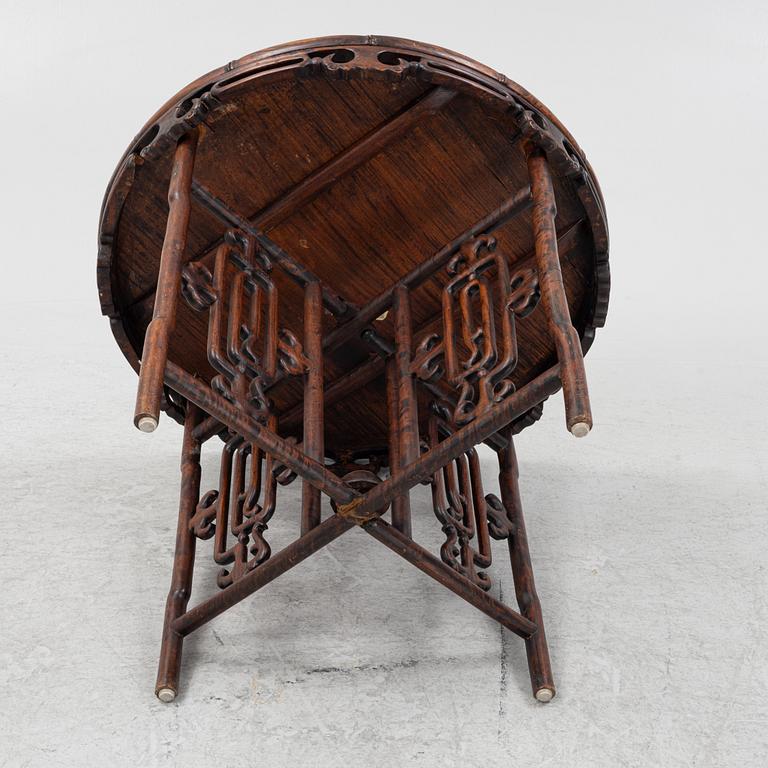 A Chinese hardwood table, 20th Century.