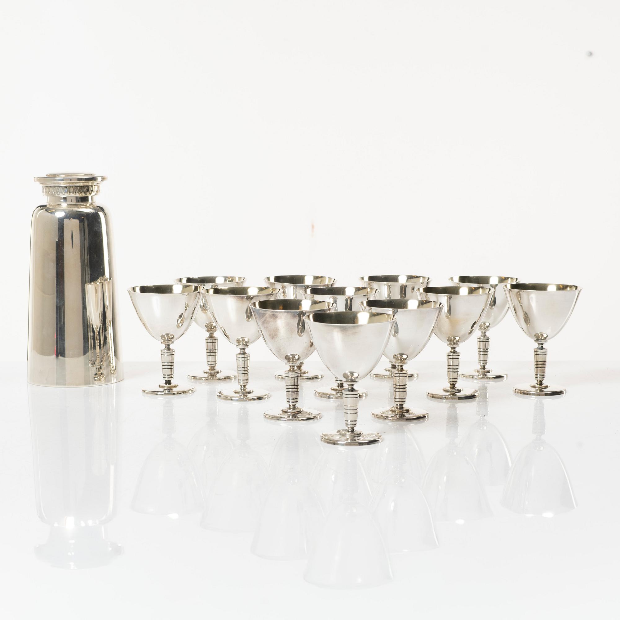 A 13 piece silver plated cocktail set by C.G. Hallberg, Sweden, 20th Century.