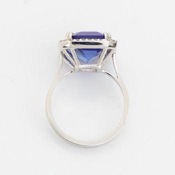 Emerald cut tanzanite and brilliant cut diamond cocktail ring.