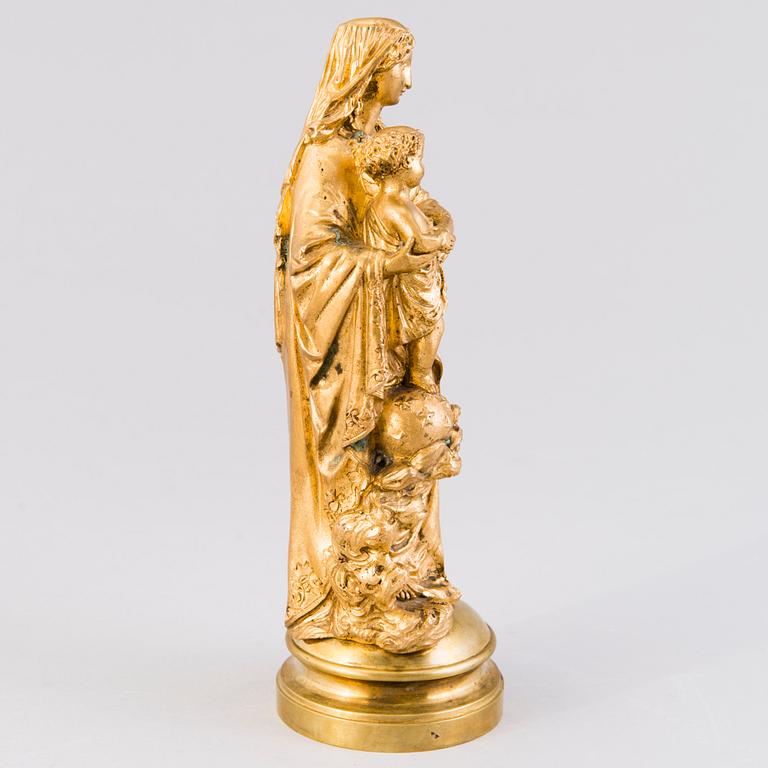 A late 19th Century gilt bronze sculpture depicting The Virgin and the Child.