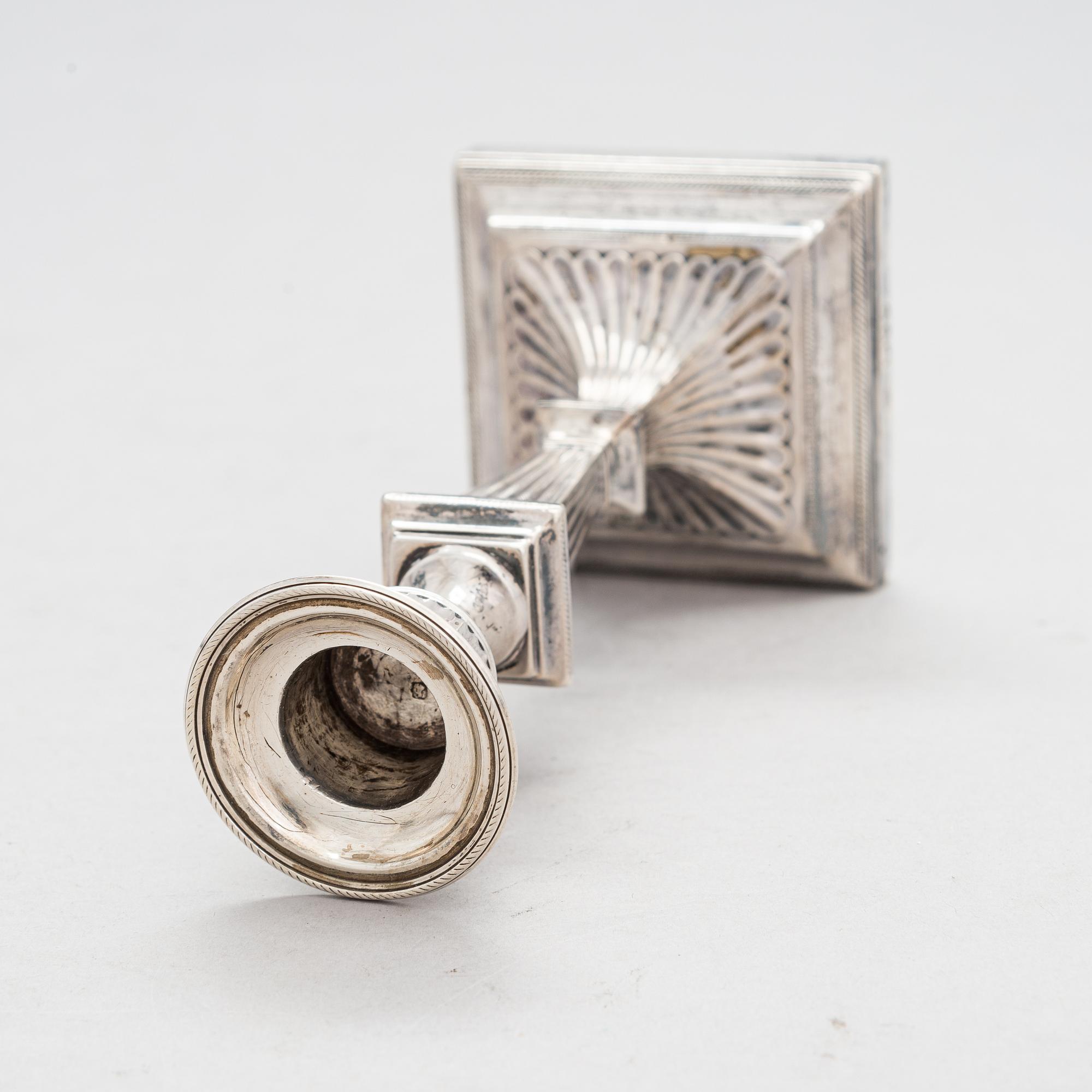 A late 19th-century sterling silver candlestick, maker's mark of William Hutton & Sons, London 1893.