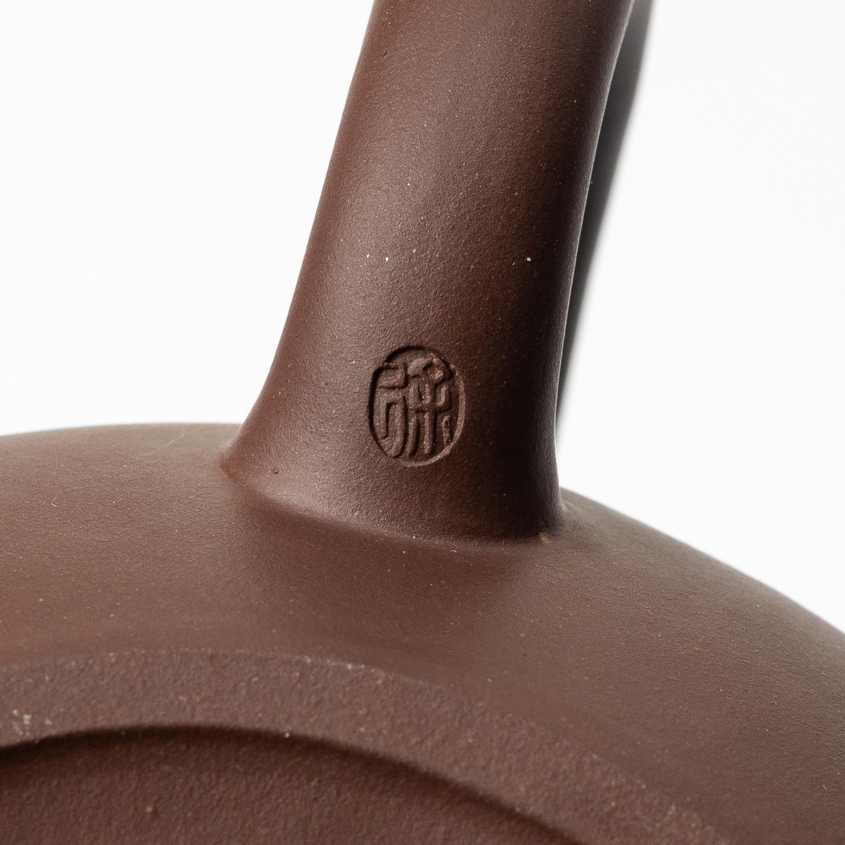 A group of three Chinese yixing teapots, 1960-80s.