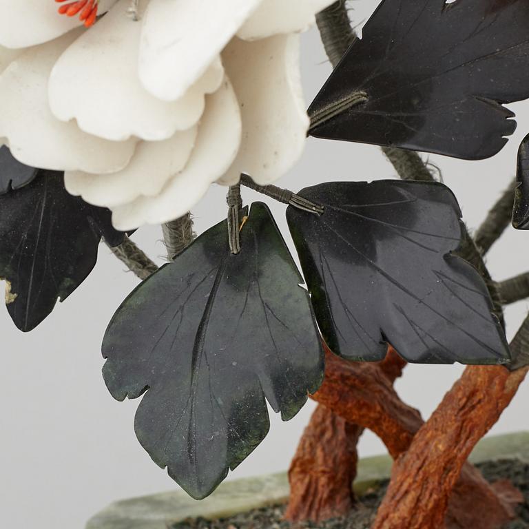 Two table decorations of different materials including agathe, nephrite quartz, stone, 20th century.