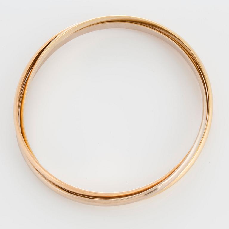 A Cartier "Trinity" bangle.