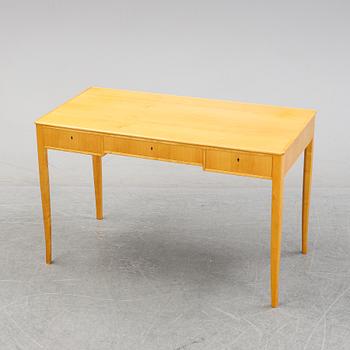 A 'Nya guldheden' desk by Carl Malmsten.