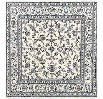 A rug, Nain, part silk, c. 204 x 196 cm.