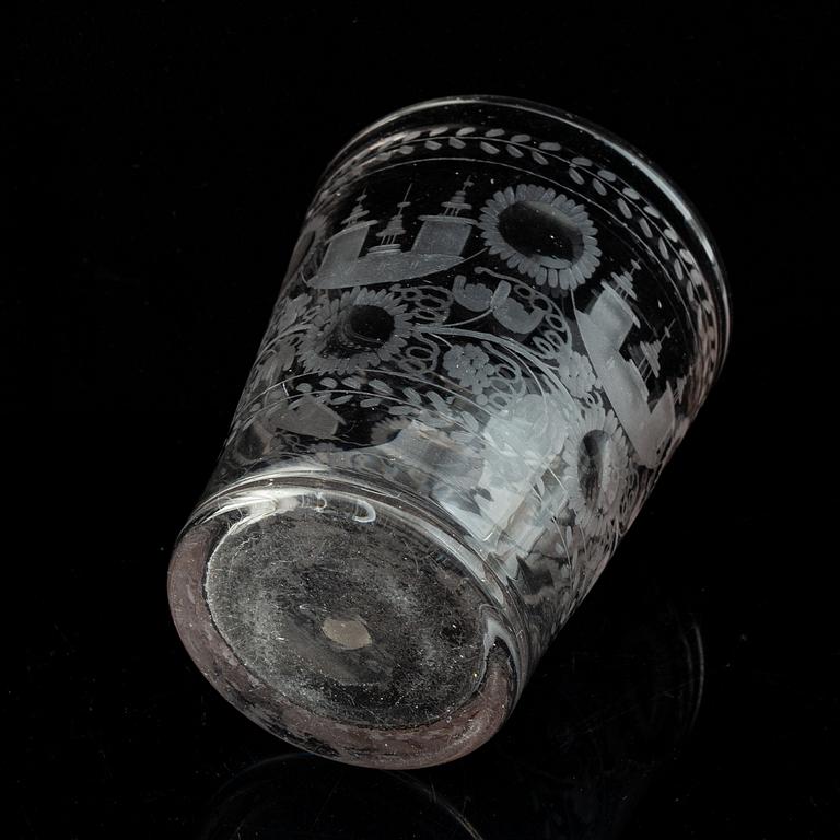 A cut and engraved glass beaker, 18th Century.