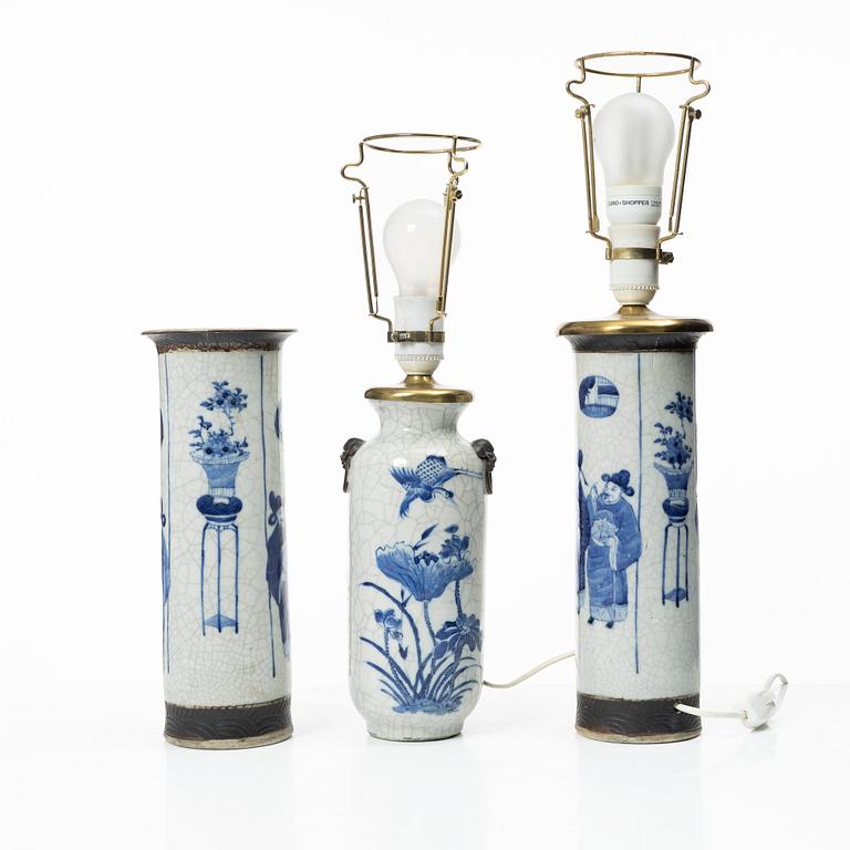 A group of three Chinese porcelain vases, two of them converted into table lamps, around 1900.