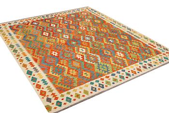A Kilim carpet, c. 303 x 256 cm.