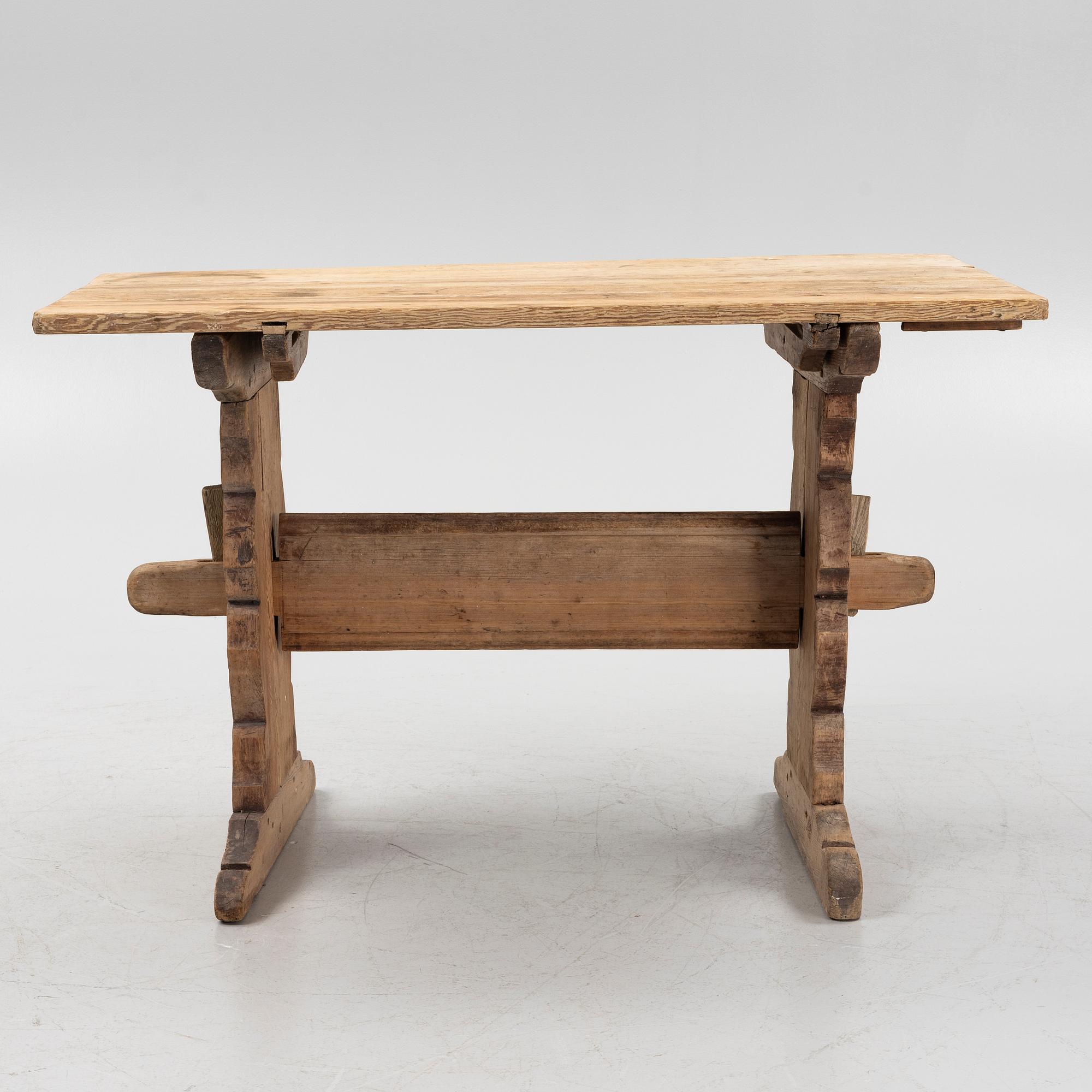 A pine trestle table, 19th century.