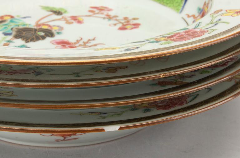 A set of four Chinese famille rose Qianlong porcelain plates.