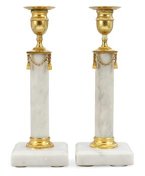 408. A pair of late Gustavian candlesticks.