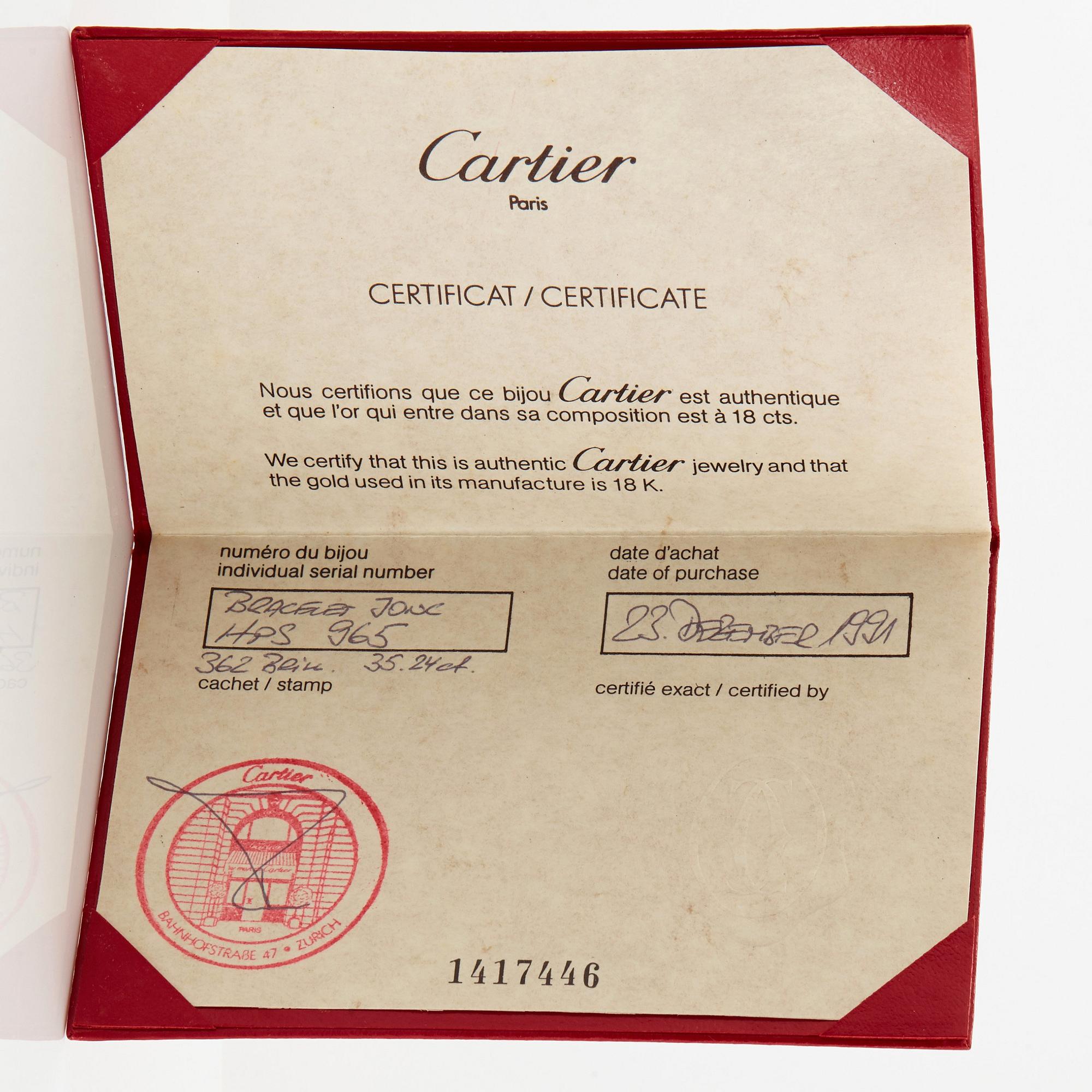 Cartier armring 18K guld med runda briljantslipade diamanter.