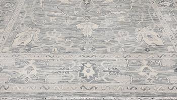 A carpet, Ziegler design, approx. 427 x 305 cm.