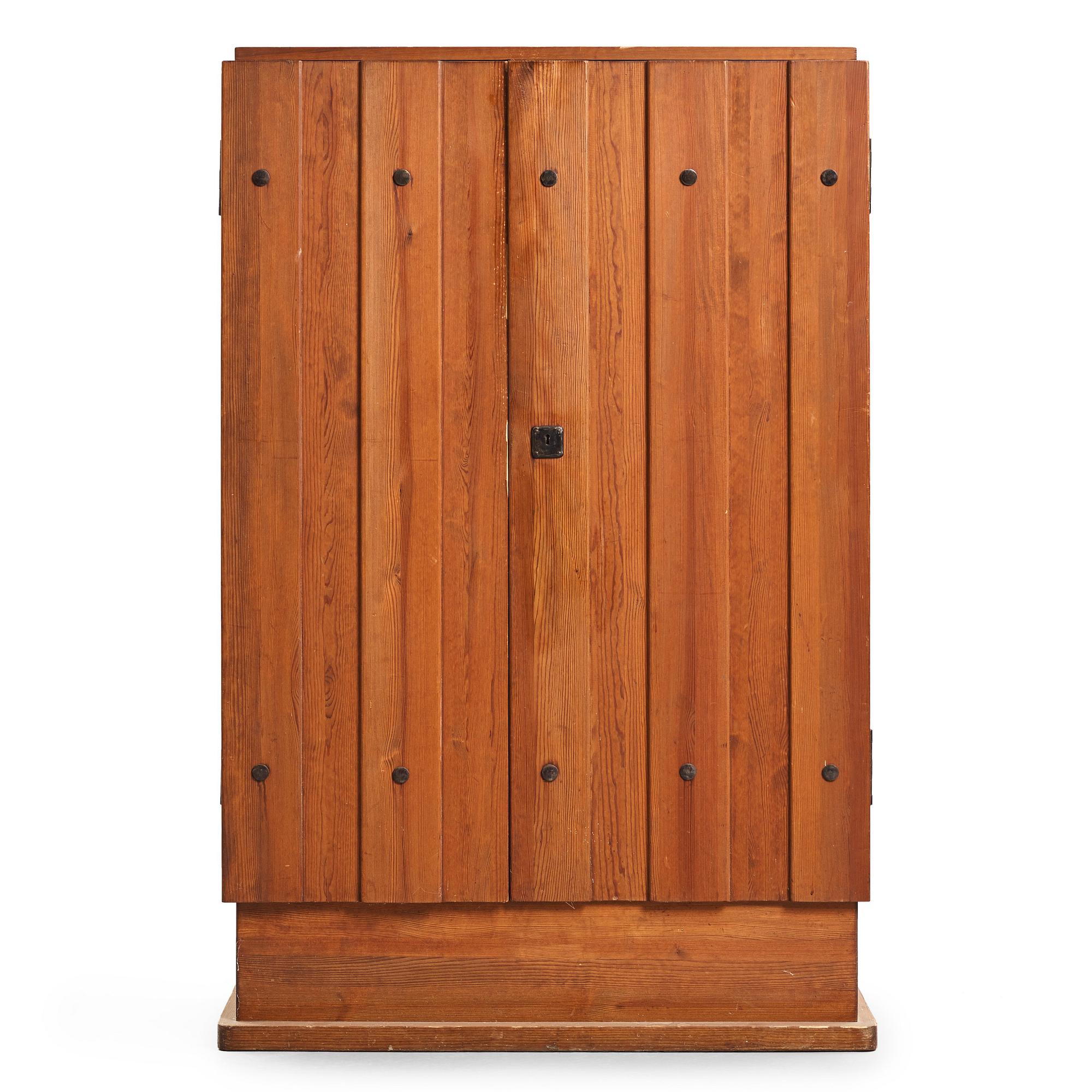 Axel Einar Hjorth, a "Lovö" stained pine cabinet, Nordiska Kompaniet, Sweden, 1930's.