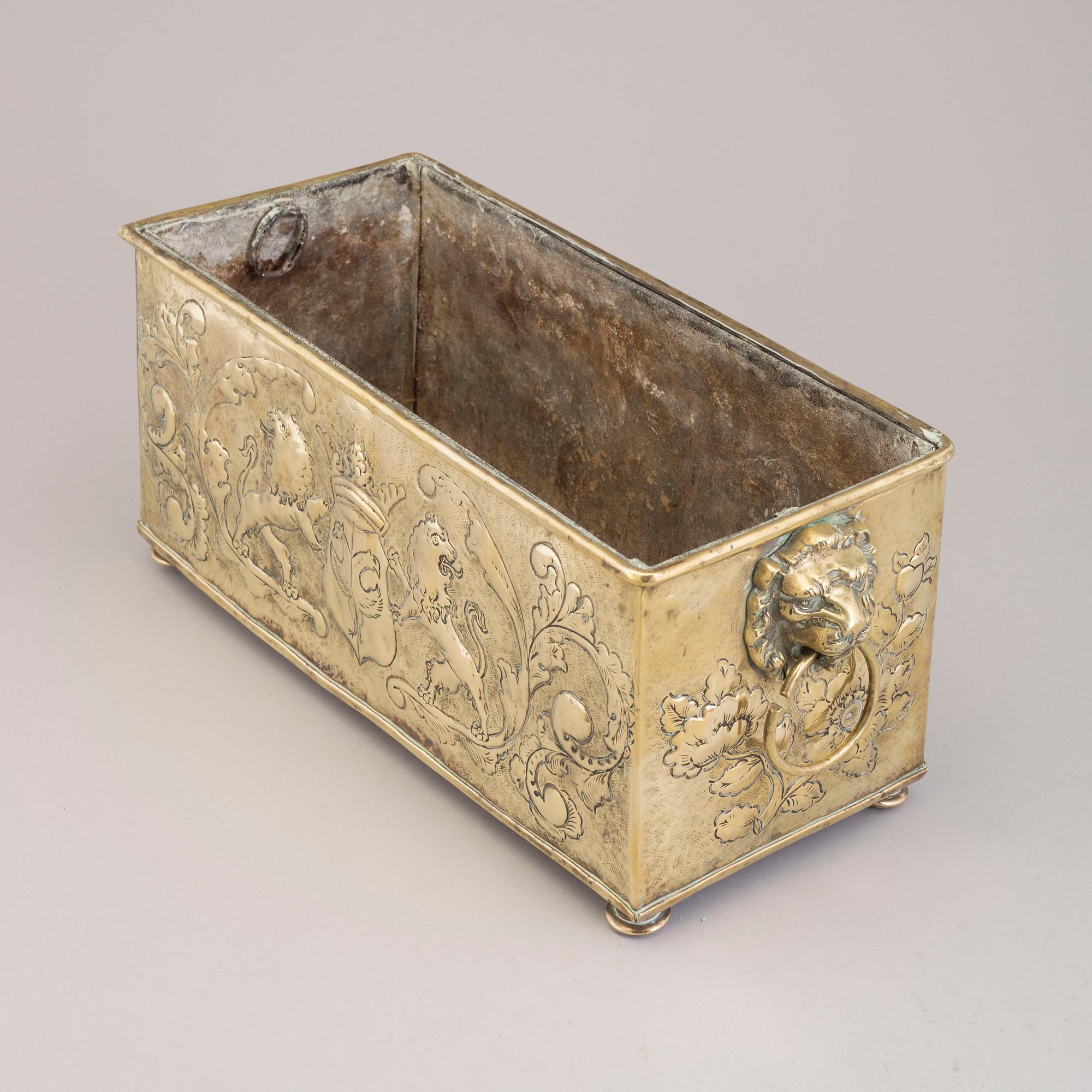 A 18th century brass jardiniere.