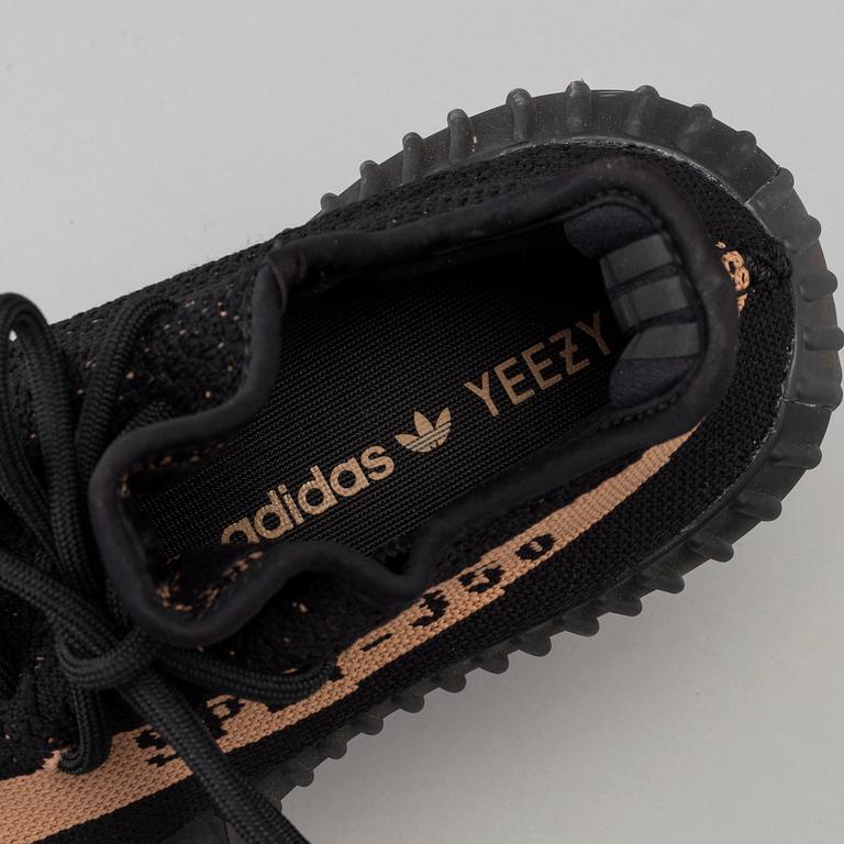 Adidas Yeezy Boost 350 V2 core black copper sneakers.