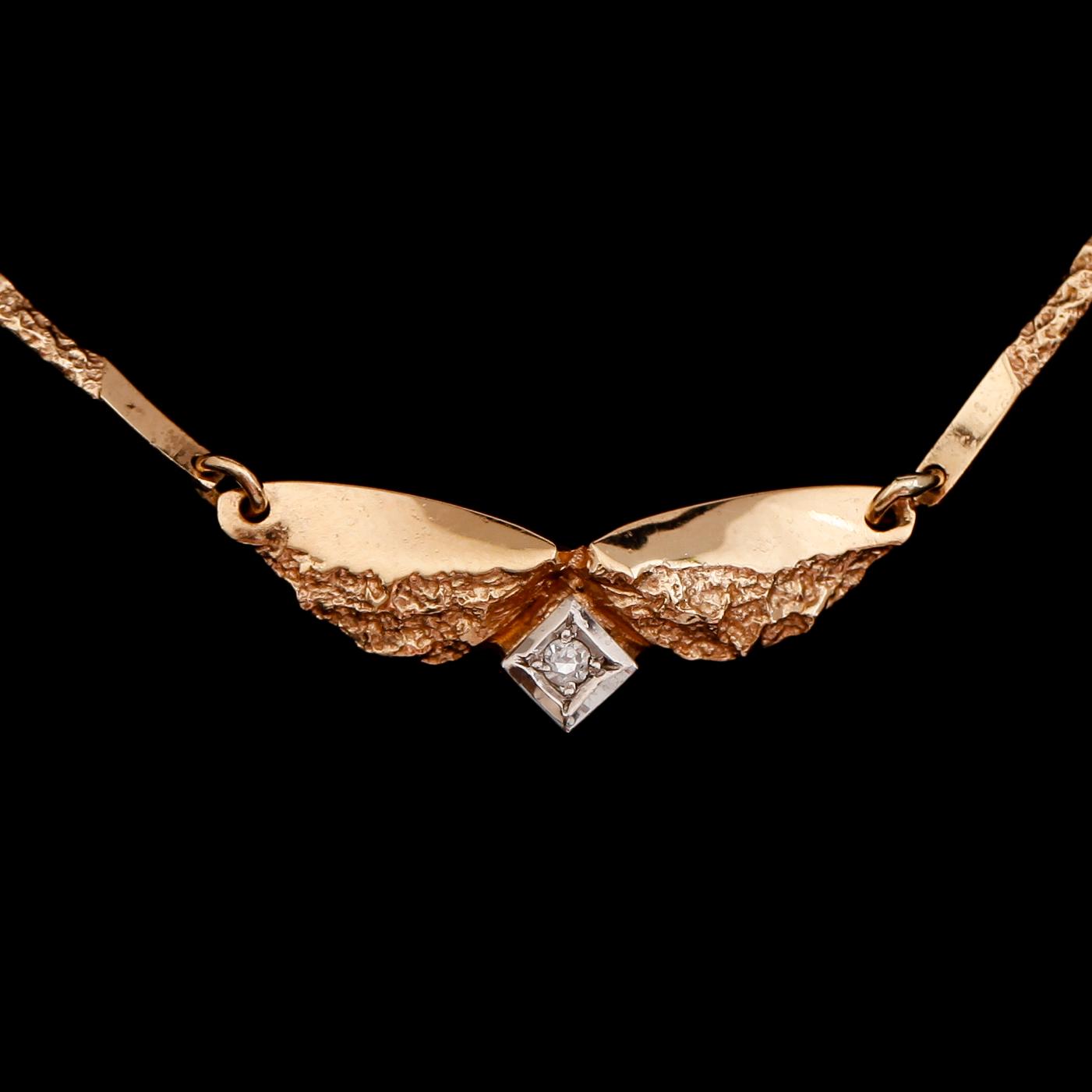 COLLIER, 18 k guld med diamant. Total vikt ca 6 g.