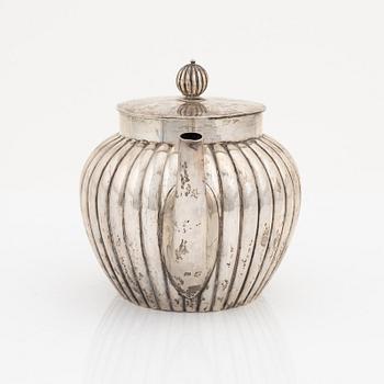 A silver teapot, bearing the mark of K. Andersson, Stcokholm, 1905.