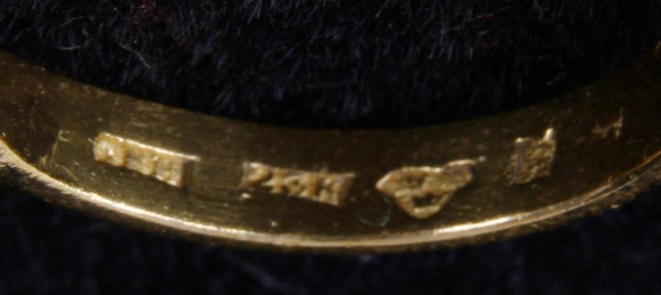 RING, 23K guld med briljant ca 0,25ct.