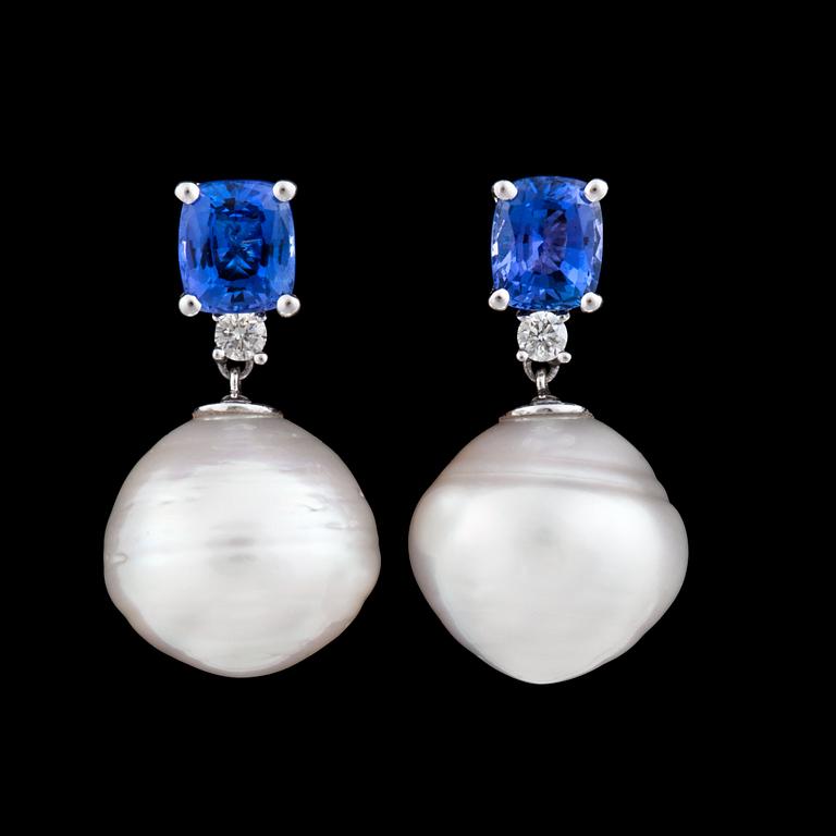 A pair of cultured South sea pearl, tanzanite and diamond earrings.