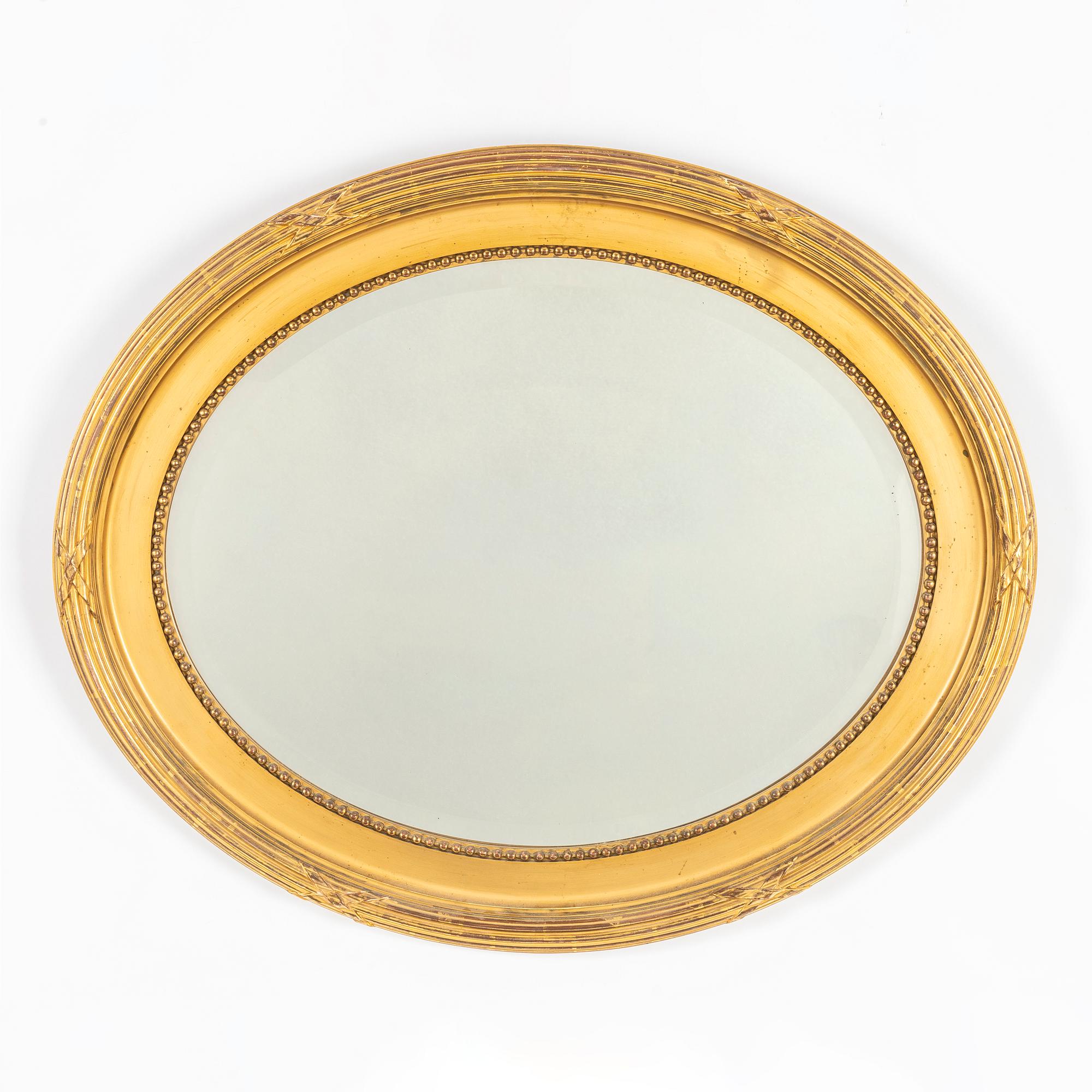 Spegel, gustaviansk stil, omkring 1900.