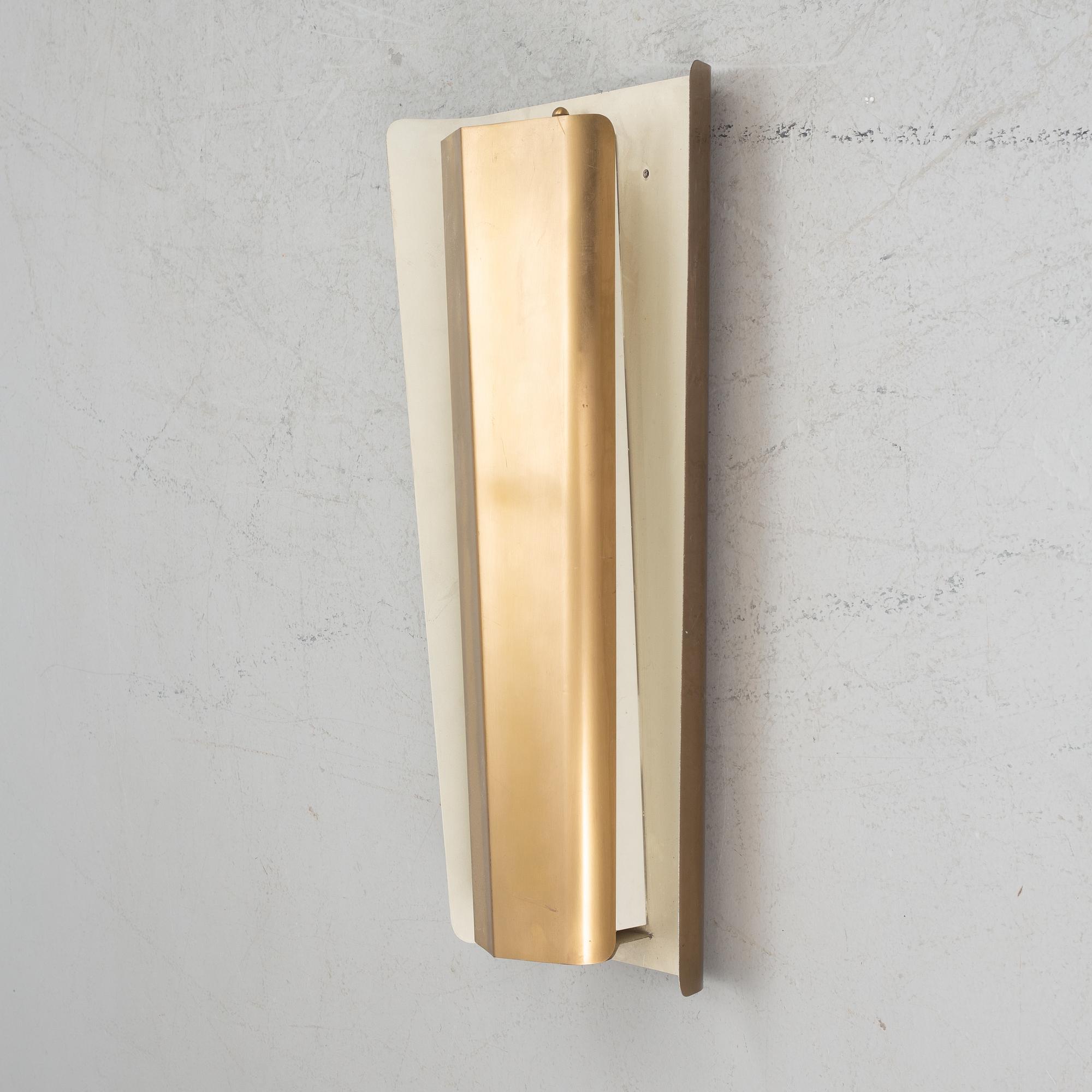 A Swedish Modern brass wall light, 1940's/50's.