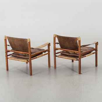 A PAIR OF ARNE NORELL "SIROCCO" ARMCHAIRS, 1960's.