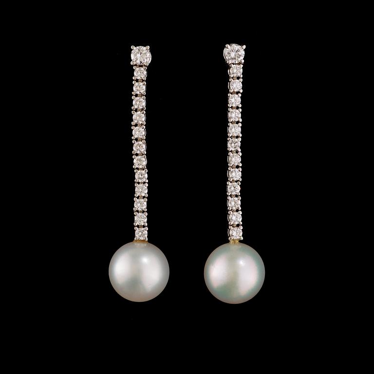 A pair of cultured South sea pearl and brilliant-cut diamond earrings.