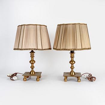 A set of two bronze 1930/40s Baroque style table lamps.