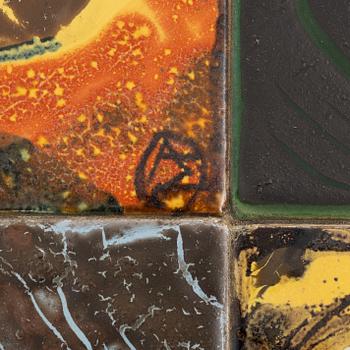 Allan Ebeling, table with various ceramic tiles, Torshälla, mid 1900s.