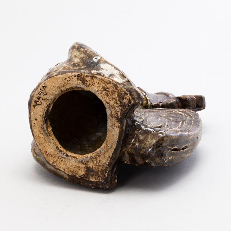 SAKARI VAPAAVUORI, a stoneware sculpture signed VSV Arabia.