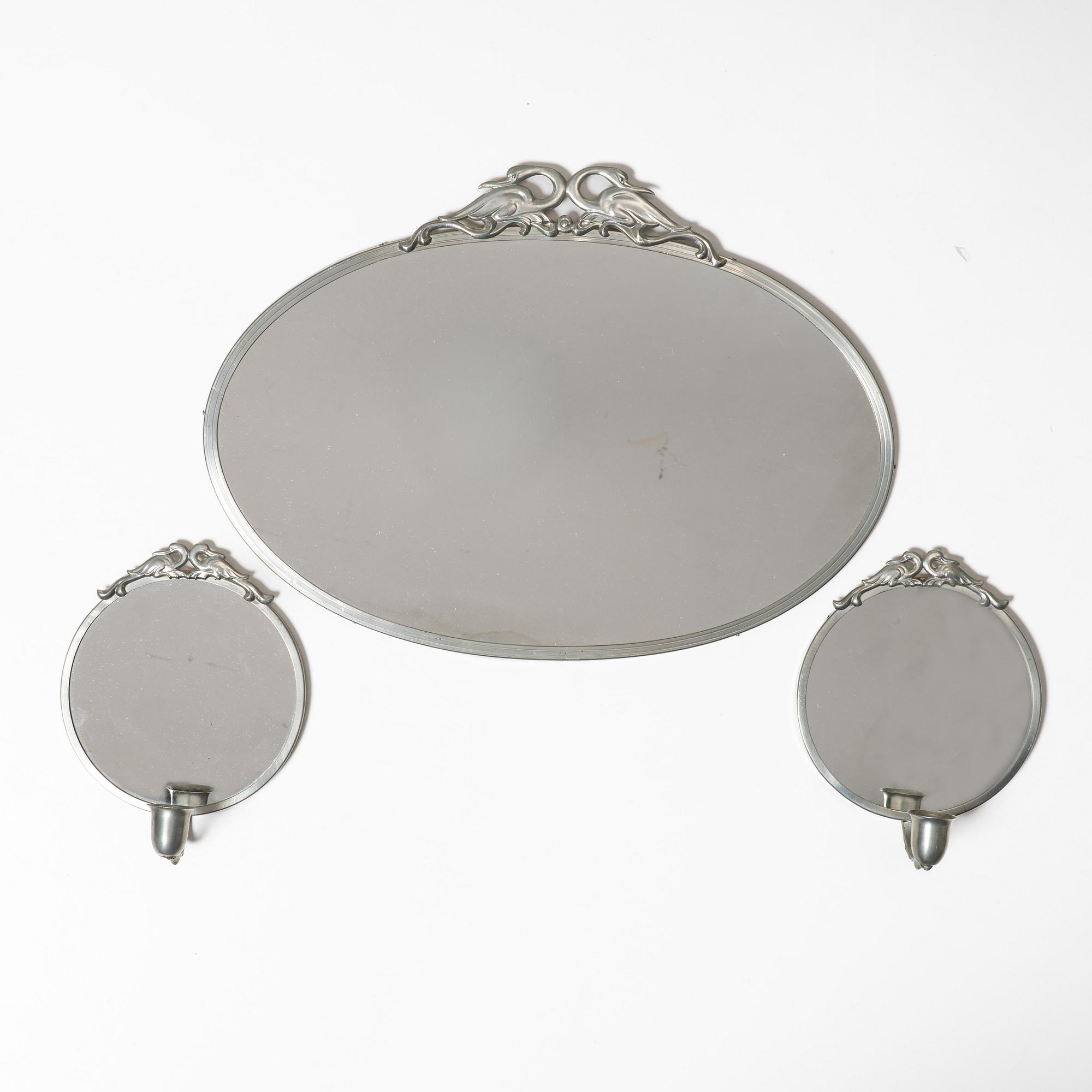 Mirror and mirror sconces, a pair, tin, Sweden, 1920s-30s.