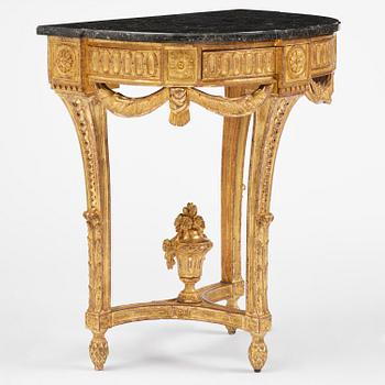 A Gustavian carved giltwood console table, Stockholm, late 18th century.