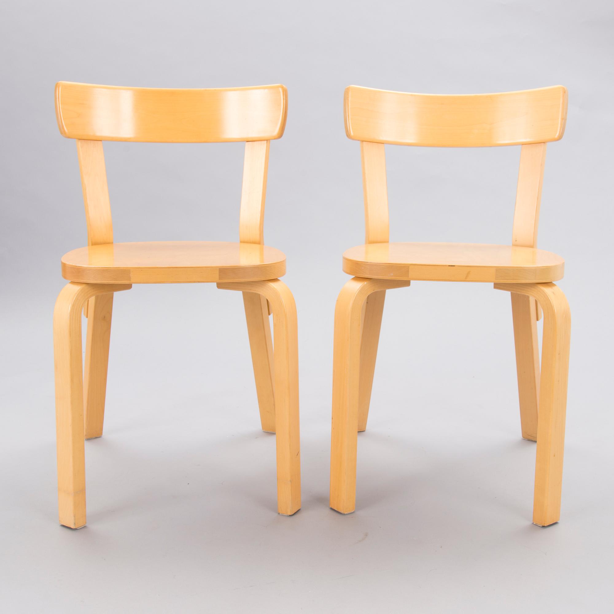 A Set of Three model 69 Chairs by Artek, late 20th Century.