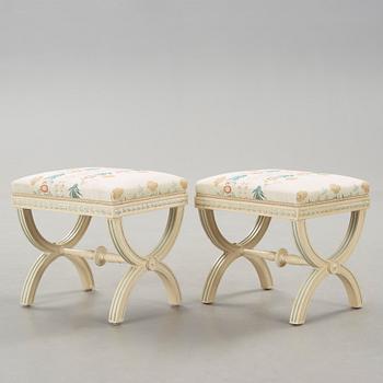 A pair of painted late gustavian stools by Ephraim Ståhl(active 1794-1820).