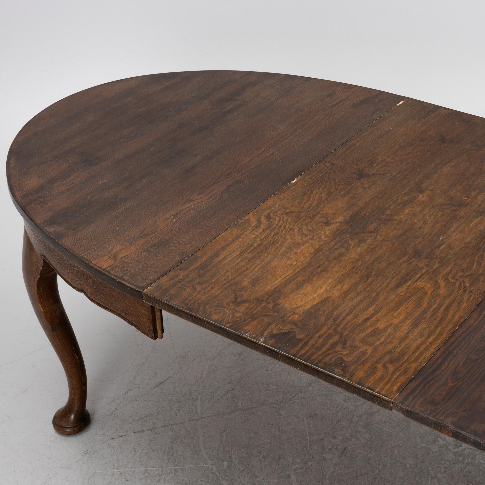 A Roccoco style dining table, Nordiska Kompaniet, 1917.