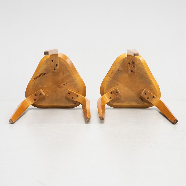 Gustav Axel Berg, a pair of Swedish Modern stools, mid 20th century.